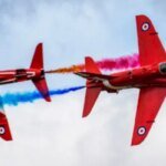 Rode pijlen gericht op overvlucht over St. John’s Harbour tijdens het avondeten